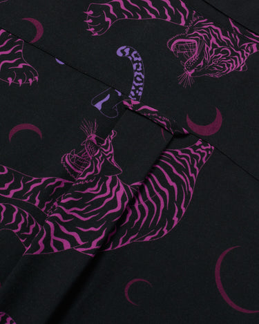 Close up photo of Blinky Bills Shirt No. 1 back hook detail. Black short-sleeved shirt with print of purple and pink tiger tattoo designs.